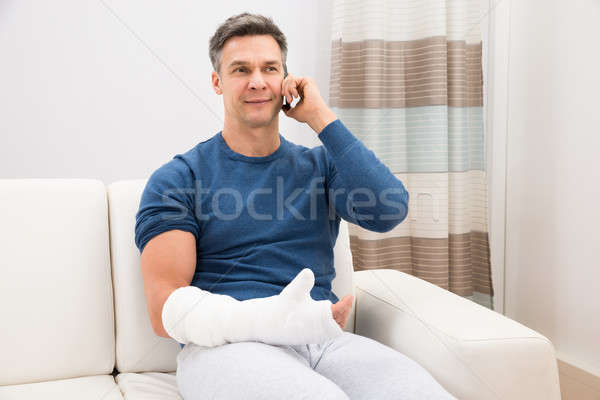 Disabled Man Talking On Cellphone Stock photo © AndreyPopov