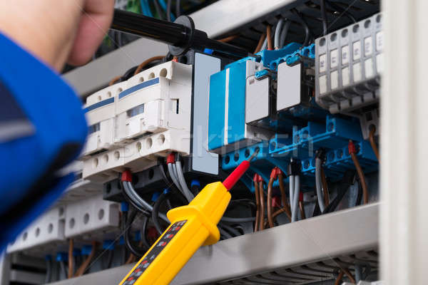 Male Electrician Checking Fusebox Stock photo © AndreyPopov