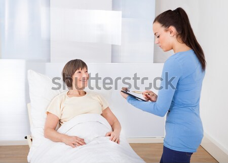 Stock photo: Man Holding Hands Of Other Female While Looking At Girlfriend