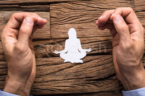 Man's Fingers In Mudra Gesture Meditating Stock photo © AndreyPopov
