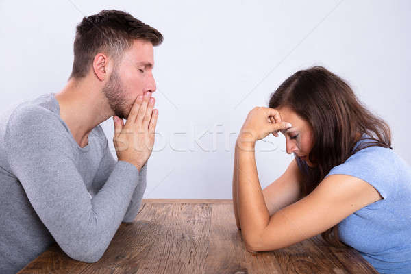 Depressiv Paar Sitzung gegenüber andere Seitenansicht Stock foto © AndreyPopov