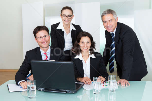 Smiling successful business team Stock photo © AndreyPopov