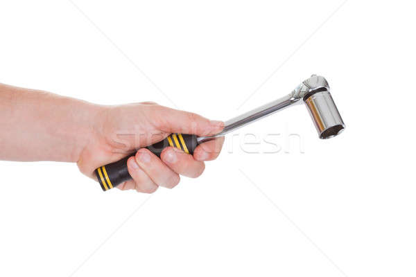 Male Hand Holding Ratchet Tool Stock photo © AndreyPopov