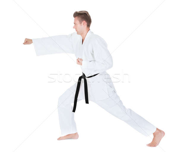 Young Man Practicing Karate Stock photo © AndreyPopov