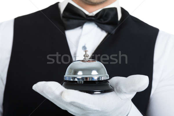 Butler Holding Service Bell Stock photo © AndreyPopov