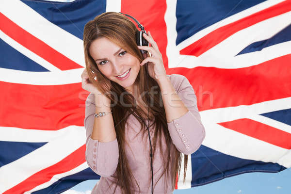 Young Woman Listening English Learning Audio Book Stock photo © AndreyPopov
