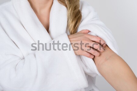 Mulher sofrimento roupão de banho mão médico Foto stock © AndreyPopov