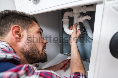 Man In Overall Applying Silicone Sealant Stock photo © AndreyPopov