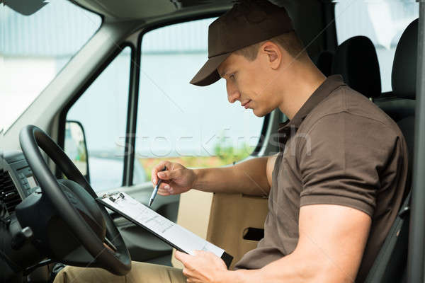 Liste van jeunes presse-papiers homme [[stock_photo]] © AndreyPopov