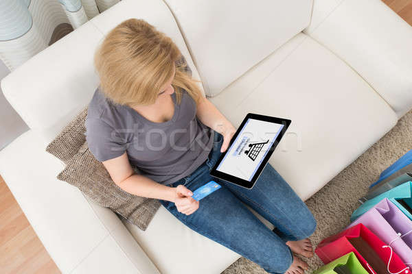 Woman Shopping Online On With Credit Card Stock photo © AndreyPopov