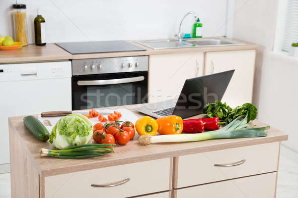 Vegetables With Laptop On A Countertop Stock photo © AndreyPopov