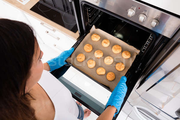 Femme cookies four vue [[stock_photo]] © AndreyPopov