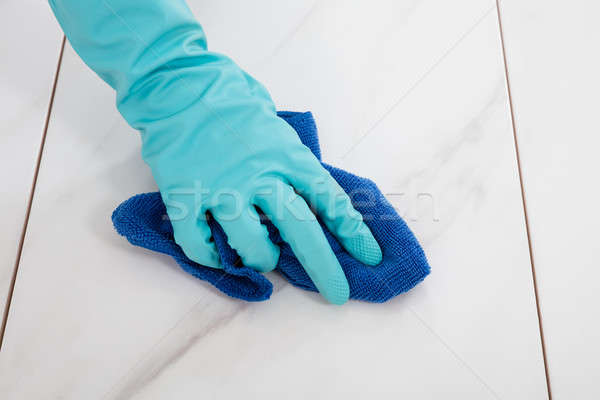 Person Cleaning Floor With Cloth Stock photo © AndreyPopov