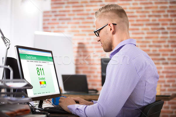 Businessman Checking Credit Score On Computer Stock photo © AndreyPopov