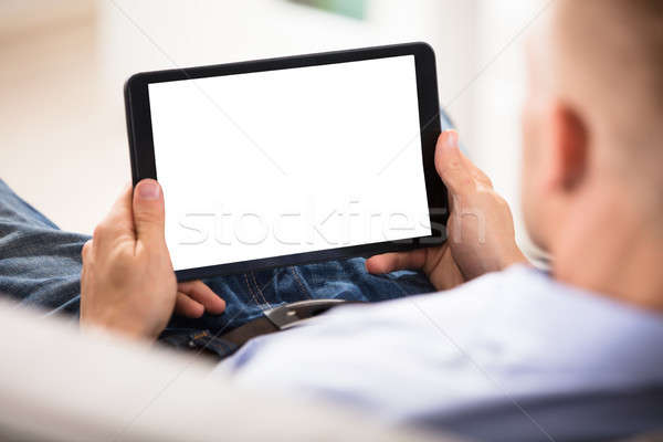 Man Holding Digital Tablet Stock photo © AndreyPopov