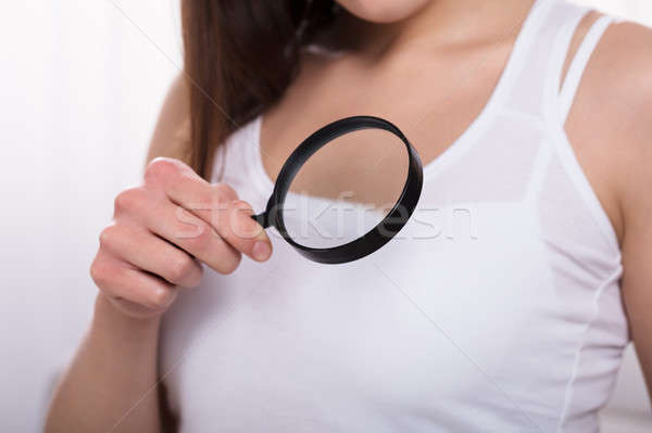 Woman Holding Magnifying Glass Stock photo © AndreyPopov