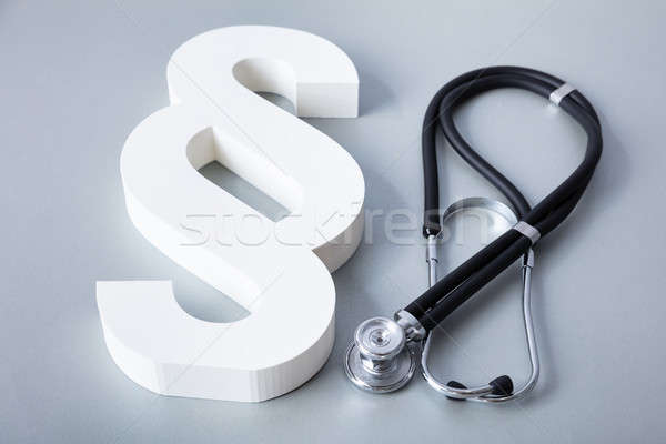 Close-up Of Stethoscope And Paragraph Symbol Stock photo © AndreyPopov