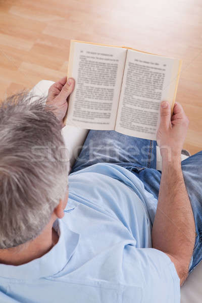 Mature Man Reading Book Stock photo © AndreyPopov