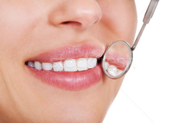 Gülümseyen kadın beyaz diş görmek ağız mükemmel küçük Stok fotoğraf © AndreyPopov