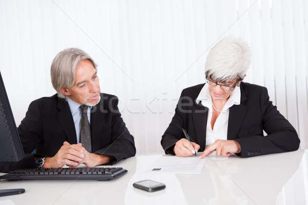 Senior partners at a business meeting Stock photo © AndreyPopov