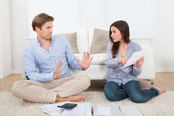 Woman Blaming Man For Excessive Expenses At Home Stock photo © AndreyPopov