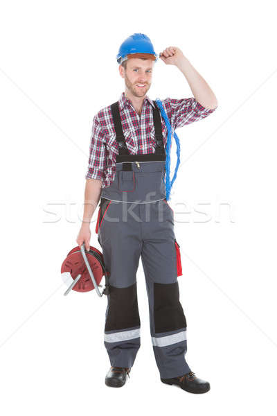 Confident Electrician Holding Cable Spool Stock photo © AndreyPopov