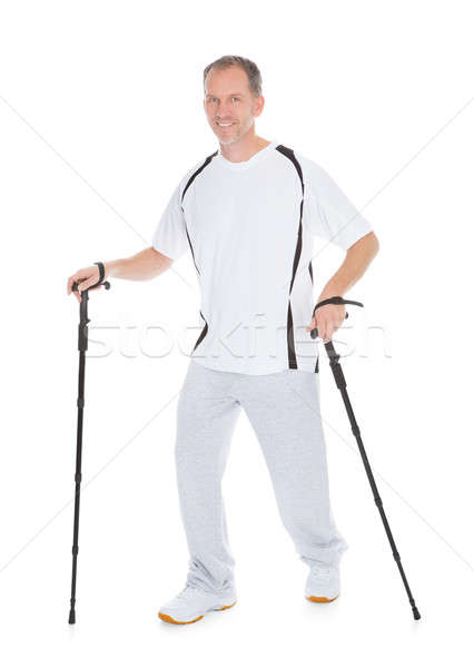 Stock photo: Man Walking With Hiking Pole