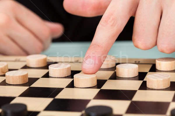 Businessman Playing Checkers Stock photo © AndreyPopov