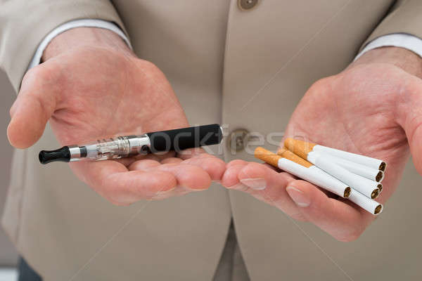 Stock photo: Businessperson Hand With Electronic Cigarette