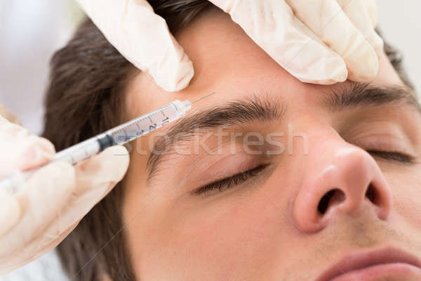 Stock foto: Mann · Botox · Behandlung · junger · Mann · Schönheit · Klinik