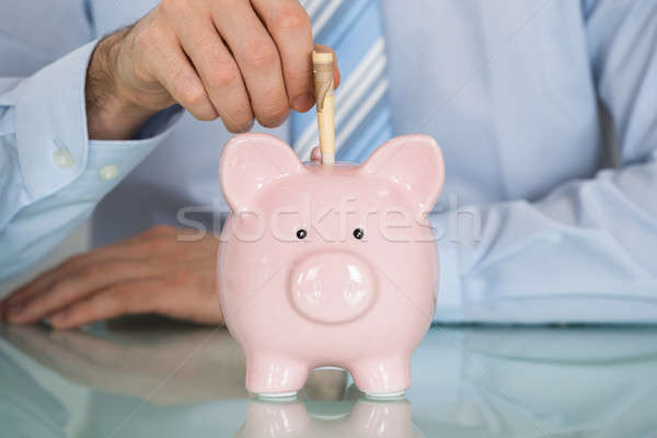 Biznesmen Uwaga banku piggy szkła bezpieczeństwa Zdjęcia stock © AndreyPopov