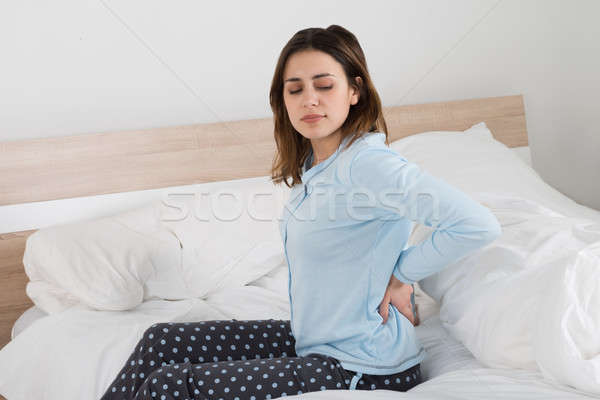 Woman Suffering From Back Pain Stock photo © AndreyPopov