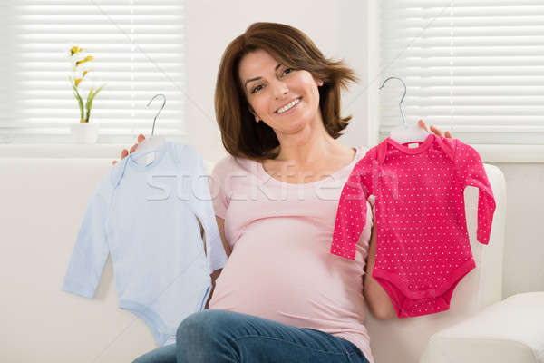Stockfoto: Zwangere · vrouw · baby · kleding · vergadering · sofa