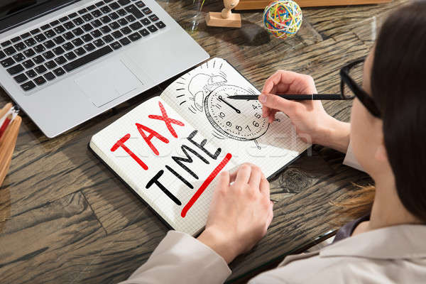 Nő rajz adó idő jegyzettömb asztal Stock fotó © AndreyPopov