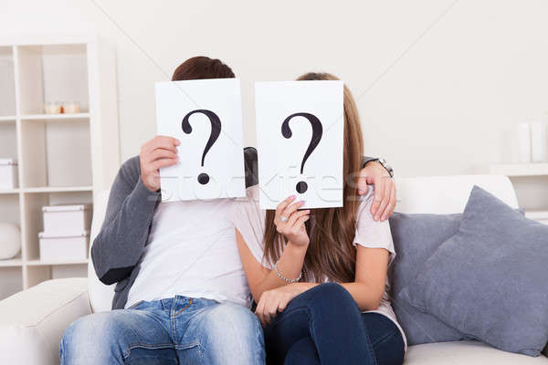 Couple with question marks Stock photo © AndreyPopov