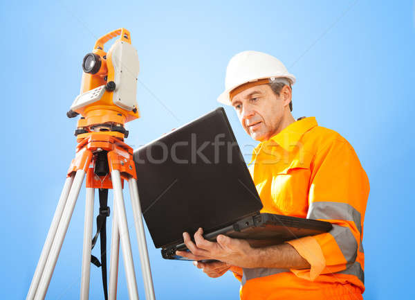 Senior land surveyor with theodolite Stock photo © AndreyPopov