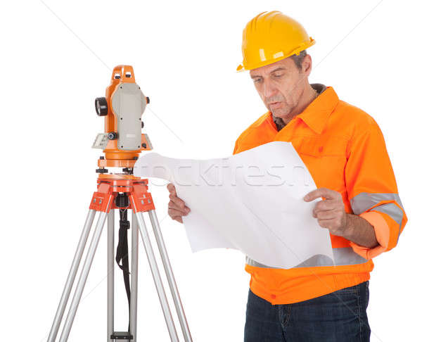 Senior land surveyor with theodolite Stock photo © AndreyPopov