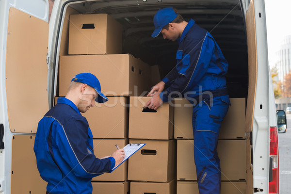 Delivery Men Unloading Boxes Stock photo © AndreyPopov