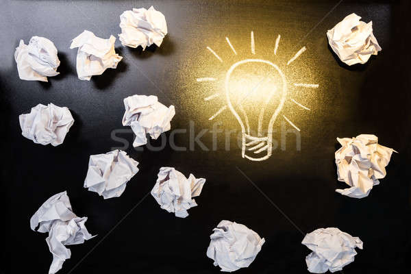 Crumpled Paper With Illuminated Light Bulb Stock photo © AndreyPopov