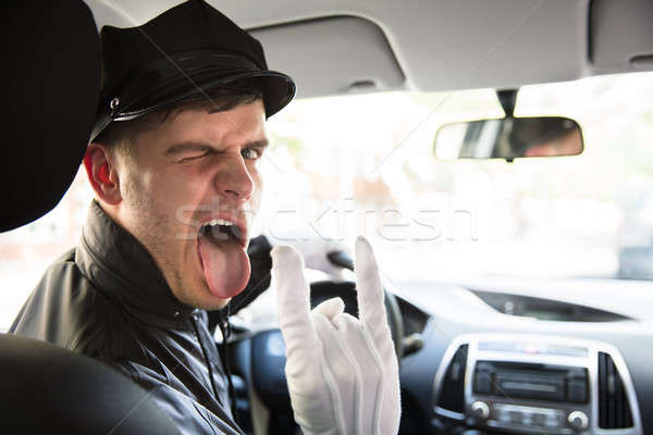 Pilote séance à l'intérieur voiture corne Photo stock © AndreyPopov