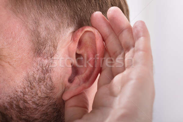 Close-up Of A Man Trying To Hear Stock photo © AndreyPopov