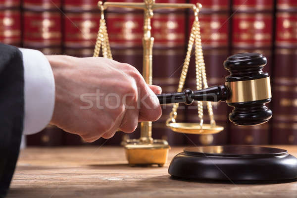 Judge Striking Mallet On Sounding Block Stock photo © AndreyPopov