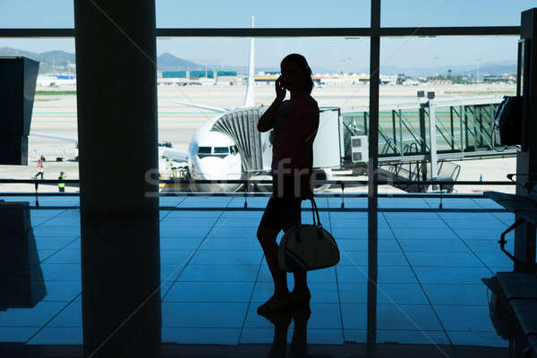 Silhouette of women in airport terminal Stock photo © AndreyPopov