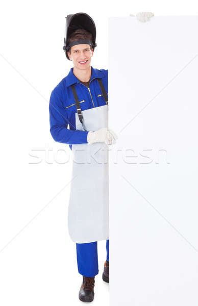 Male Welder Holding Placard Stock photo © AndreyPopov