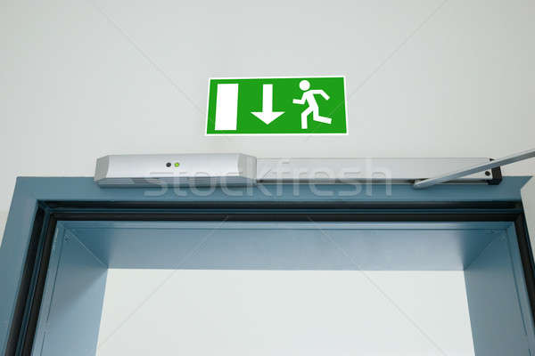 Emergency Evacuation Sign Stock photo © AndreyPopov
