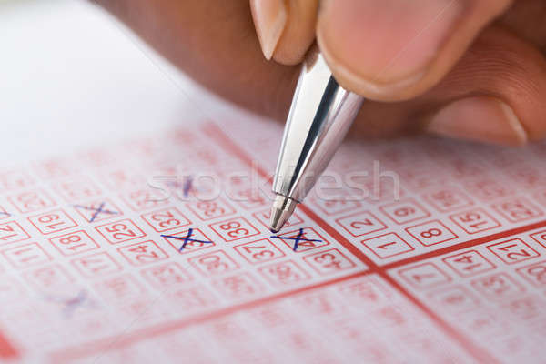 Személy szám lottó jegy toll közelkép Stock fotó © AndreyPopov