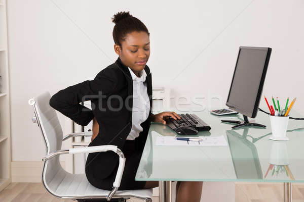 女性実業家 腰痛 オフィス 小さな アフリカ ストックフォト © AndreyPopov