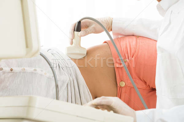 Woman Getting Ultrasound From Doctor Stock photo © AndreyPopov