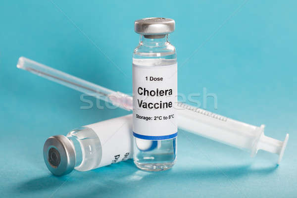 Cholera Vaccine In Vial With Syringe Stock photo © AndreyPopov