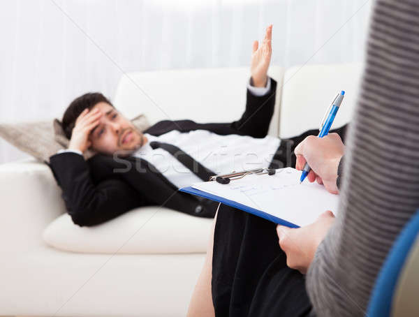 üzletember beszél pszichiáter magyaráz valami kanapé Stock fotó © AndreyPopov